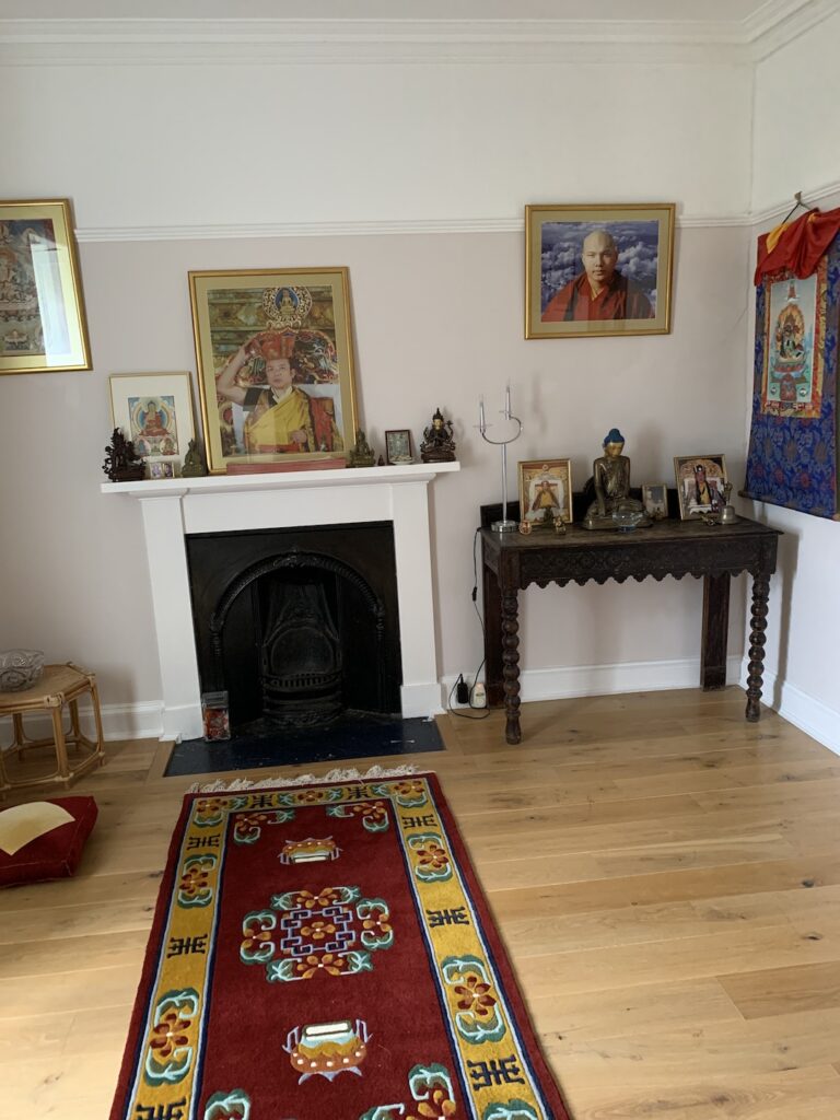 room with buddhist items